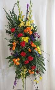 If the deceased is being cremated, you can still send the funeral flowers to the crematorium. Spectacular Sunset Sympathy Spray Of Flowers In 2021 Funeral Flower Arrangements Funeral Flowers Funeral Flowers Diy