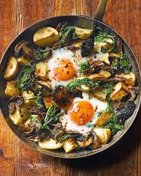 Baked Eggs With Mushrooms Potatoes Spinach And Gruyere Recipe Delicious Magazine