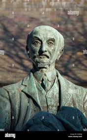 English literature. A bronze statue and monument to the British writer and  poet Thomas Hardy, created by Eric Kennington. Dorchester, Dorset, England  Stock Photo