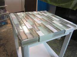 Procrastinating on refurnishing your table top? How To Tile A Small Table Top