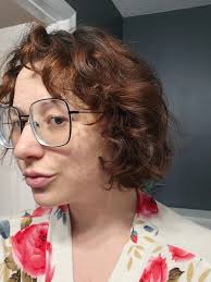 The dullness of my day: I had a migraine today, so I didn't really get  ready outside of letting my hair air dry after washing it. I have naturally  wavy 2b-2c curls,