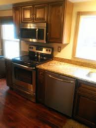 Cambridge Maple Cabinets With Granite Counter Top Kitchen Bathroom Remodel Kitchen Kitchen Cabinets And Granite