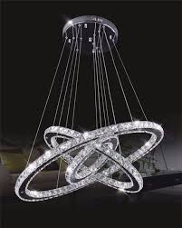 This beautiful lighting fixture features crystals which capture and reflect the light from its 12 bulbs. Modern Lighting 3 Ring Chandelier Hot Sale Led Crystal Chandelier Light Pendant Lamp Lustre Crystals Ring Diamond Ring Led Lamp Stainless Steel Hanging Light Fixtures Wish