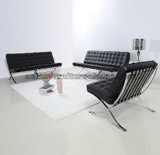 Beautiful and genuine italian leather drapes the exterior and leather is also used in the fastenings that are wrapped around the frame. Black And White Barcelona Leather Chair Sofa And Ottoman