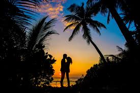 Man and woman back to back silhouette. Silhouette Of Man And Woman Kissing Free Stock Photo