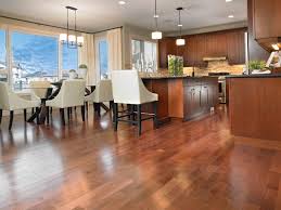 In love with the dark floors and bookcase. Interior Delightful Laminate Wood Flooring Ideas Red Cherry Wood Flooring Hardwood Kitchen Di Dining Room Floor Hardwood Floor Colors Wooden Kitchen Cabinets