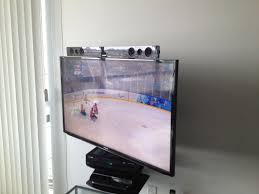 However it does come with bracketry if you can install on the wall either above or below the television. Samsung Sound Bar Mounted To The Tv Using Sound Bar Brackets Samsung Led Tv Is Mounted To The Wall With An Articulating B Sound Bar Mount Tv Bracket Sound Bar