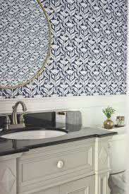 Smaller trees are seen in the distance, which creates a background and a foreground in this design. How To Hang Removable Wallpaper With A Couple Of Issues Resolved Jones Design Company