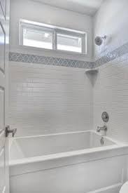 Best 25 Subway Tile Bathrooms Ideas Only On Pinterest Tiled Bathrooms White Subway Tile Shower And Bathroom Bathrooms Remodel Window In Shower Bathtub Tile