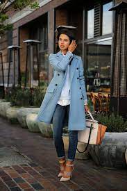 Sky blue is a colour that resembles the colour of the unclouded sky at around noon (azure) reflecting off a metallic surface. Fashion Blog By Annabelle Fleur Downtown Girl Fashion Blue Coats Winter Fashion