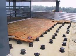 Structural Deck Tiles For Uneven Surfaces Maybe Would Be An Option For The Uneven Grass In The Backyard Pin Outdoor Wood Decking Outdoor Deck Tiles Deck Tiles