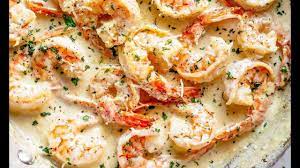 Crisp white wine combined with butter, garlic, and herbs creating a versatile sauce that delivers complex, savory flavor in each bite. Creamy Garlic Shrimp With Parmesan Low Carb Cafe Delites