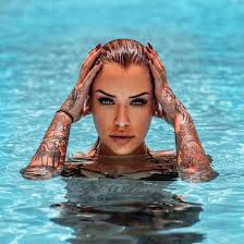 Her height is 5ft 6ins (1.65m) and her weight is around 120lbs (55kgs). Tattoo Model Laurence Bedard Montreal Canada Inkppl