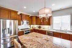 For example when you combine golden crystal granite countertops with white cabinets you can get a very homely and almost country house feel to your room. 7 Golden Beach Granite Ideas Granite Kitchen Kitchen Remodel Kitchen Design
