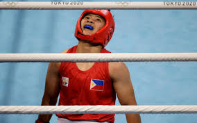 Filipina boxer nesthy petecio is assured of at least a bronze medal after a victory in the quarterfinals of women's featherweight in the boxing competitions of the tokyo olympics. Em Kvfx0ilslxm