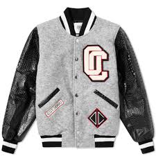 It has leather sleeves with wool lining, so it's extra warm. Opening Ceremony Oc Varsity Jacket Opening Ceremony