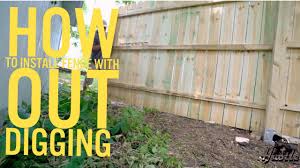 This is much easier than the more traditional route of building support posts and rails, then individually attaching each board. How To Install Wood Panel Fence With Out Digging Youtube