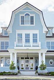 Notice how all houses have the same color of roofing shingle. Baby Blue Bright White House Exterior Blue Best Exterior House Paint House Exterior