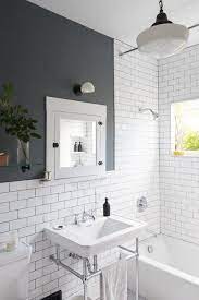 Before After A Diy Couple Tackle Their 1915 Craftsman In San Diego Craftsman Bathroom Vintage Bathroom Lighting Small Bathroom Makeover