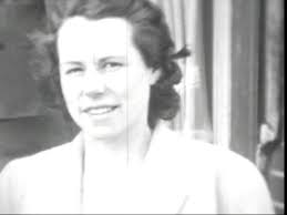 Picture taken in the mid-1940s of 2 young men in front of A.J. Walker's  furniture store and funeral home at 249 Josephine St. This picture was  taken by my Uncle Arthur (Brown)