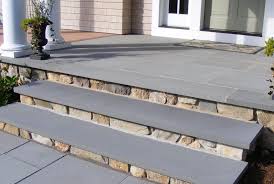 Front porch steps, if designed correctly, can make a small porch appear larger or a large porch more grand! Bluestone Natural Stone Treads Stoop Entry Way Front Steps Patio Stairs Front Porch Stone Front Porch Design