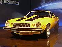 At the beginning of the transformers movie the beat up, old one is a 1976 camaro and at the end the new improved one is a 2010 camaro. Bumblebee Transformers Wikipedia