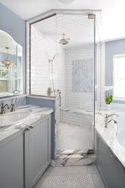 When tiling the corner shower unit, always start with the floor before proceeding to the walls. Corner Shower Ideas Transitional Bathroom Lauren Shadid Architecture
