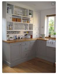 If your wall bows out a lot, shim it before you hang the cabinet. Gray Base Cabinets In Kitchen Butcher Block Countertops Kitchen Design Kitchen Remodel Kitchen Design Small