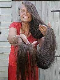 70 Years Old Woman Who Has Long Hair Down To The Ground Long Hair Styles Hair Magazine Cool Hairstyles