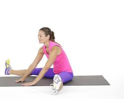 Seated straddle stretch for inner thigh