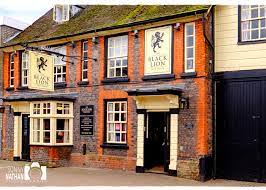 Is drinking a how to stay hoppy by this is how at the black lion inn. The Black Lion