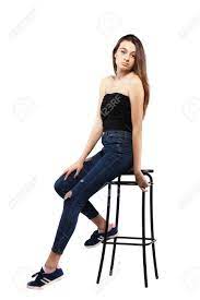 Check spelling or type a new query. Portrait Of A Beautiful Brunette Girl Sitting On A Bar Chair Stock Photo Picture And Royalty Free Image Image 95964253