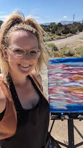 Painting a spood in rainbow splatter with oil paints