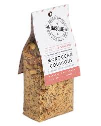 Put the apricots, almonds, green onions, mint, and cilantro on a cutting board and coarsely chop everything up; Apricot Pistachio Moroccan Couscous From Basque With Love