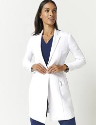 Kristi Lab Coat In White Lab Coats By Jaanuu Medical Scrubs Outfit Medical Scrubs Fashion Medical Outfit