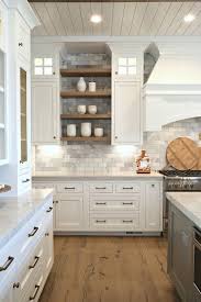 Love The White Cabinets Marble Subway Tiles And Wood Open Shelving Between Cabinet Kitchen Cabinets Decor Rustic Farmhouse Kitchen Farmhouse Kitchen Backsplash