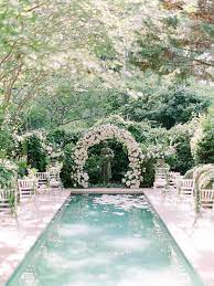 All White Floral Arch By Design House Of Flowers For Intimate Wedding Ceremony Wedding Pool Party Wedding Pool Party Decorations Backyard Wedding Pool