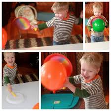 When choosing a badminton racket for kids, the most important thing you can do is look at your child! Play A Game Of Balloon Badminton With Your Toddler Gross Motor Activities Activities For Kids Childrens Activities