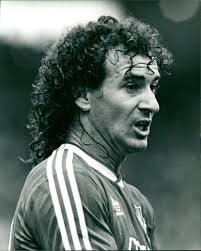 Craig Johnston of Liverpool shielding the ball from Manchester City's Tommy  Caton in the early 1980s. Craig is a legend at Liverpool and Tommy was a  young talented Scouser from Kirkby who