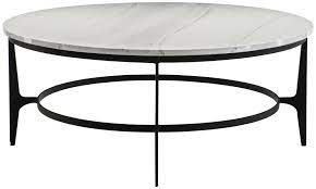 In the center of your seating area to finish your décor in sleek style. Round Metal Cocktail Table Bernhardt