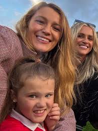 Erin McClean rubs shoulders with Blake Lively and Ryan Reynolds at Wrexham  match