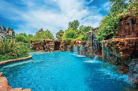 Drake S Got A Bigger Pool Than Ye And More Stars With Swanky Swimming Holes Backyard Pool Landscaping Amazing Swimming Pools Pool Landscaping