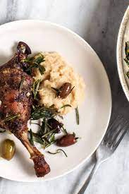 Slow Roasted Duck With Mashed White Beans Sizzled Herbs And Olives Recipe Recipe Recipes Olive Recipes Nyt Cooking