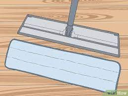Damp mop your pergo floor with a mixture of 1 cup (250 milliliter) vinegar to 1 gallon (3.8 liters) warm water. 3 Ways To Clean Laminate Wood Floors Without Streaking Wikihow