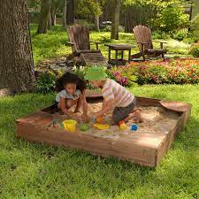 Wooden Backyard Sandbox With Built In Corner Seating And Mesh Cover In 2021 Backyard Sandbox Sandbox Backyard