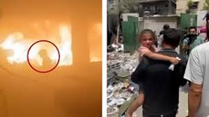 Young girl escapes burning Gaza school ...