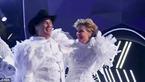 Discover (and save!) your own pins on pinterest The Masked Singer Clint Black And Wife Lisa Hartman Black Remove Snow Owls Costumes On Fox Show Readsector