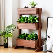 If you'd like to build your own structure, here is a good idea. Garden Freestanding Elevated Planter With 4 Container Boxes For Patio Balcony Indoor And Outdoor Taleco Gear Vertical Raised Garden Bed Pots Planters Container Accessories Patio Lawn Garden Fcteutonia05 De