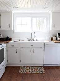 Whether kitchen cabinets should go all the way up to the ceiling is dependent on the size of your upper cabinets and the standard height of your ceiling that has gradually evolved over time from 8 feet tall to 9 or 10 feet tall on the first floor. How To Make Your Low Ceiling Rooms Appear Taller Low Ceiling Kitchen Ceiling Country Kitchen