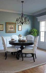 .you can see for yourself how incredible aqua blends with wood and gold tones…this room is stunning. Charming Seaside Living Sw Interesting Aqua And Black Chandeliers Dining Room Paint Colors Dining Room Colors Living Room Color